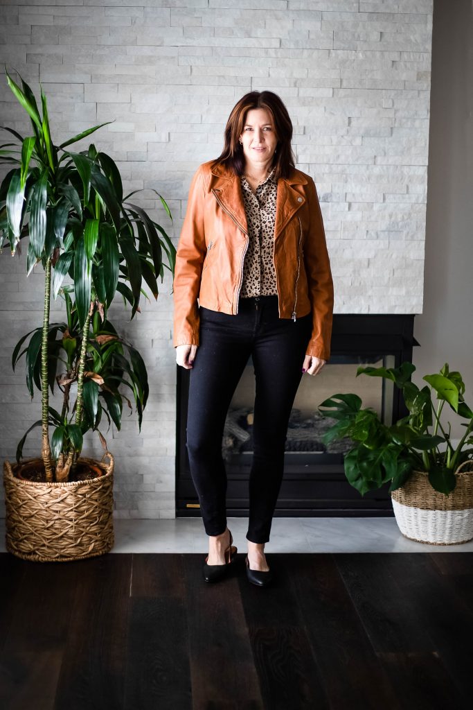 Madewell Leather jacket, leopard top, black jeans and flats.