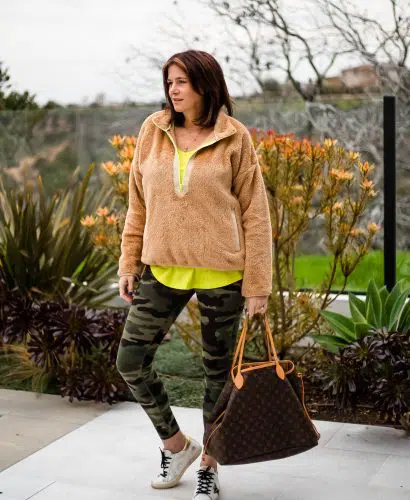 Over 40 women wearing J.Crew weekendline fleece half zip with Camo leggings