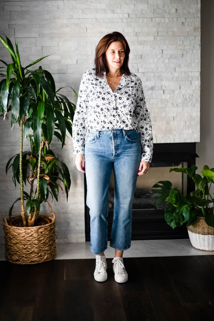 Midlife women wearing Grayson Hero shirt, straight leg jeans and sneakers