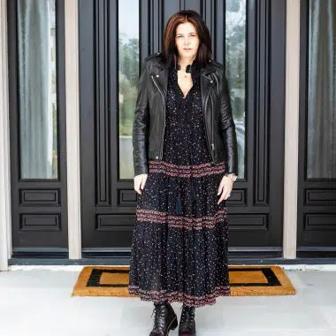 Midlife women wearing Free people maxi dress with Dr. Martens.