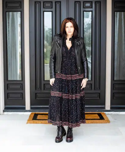 Midlife women wearing Free people maxi dress with Dr. Martens.