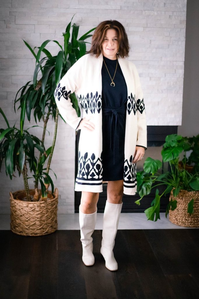 Women wearing Vince Tie Front T-shirt Dress, Oversized cardigan with Everlane Cream boots