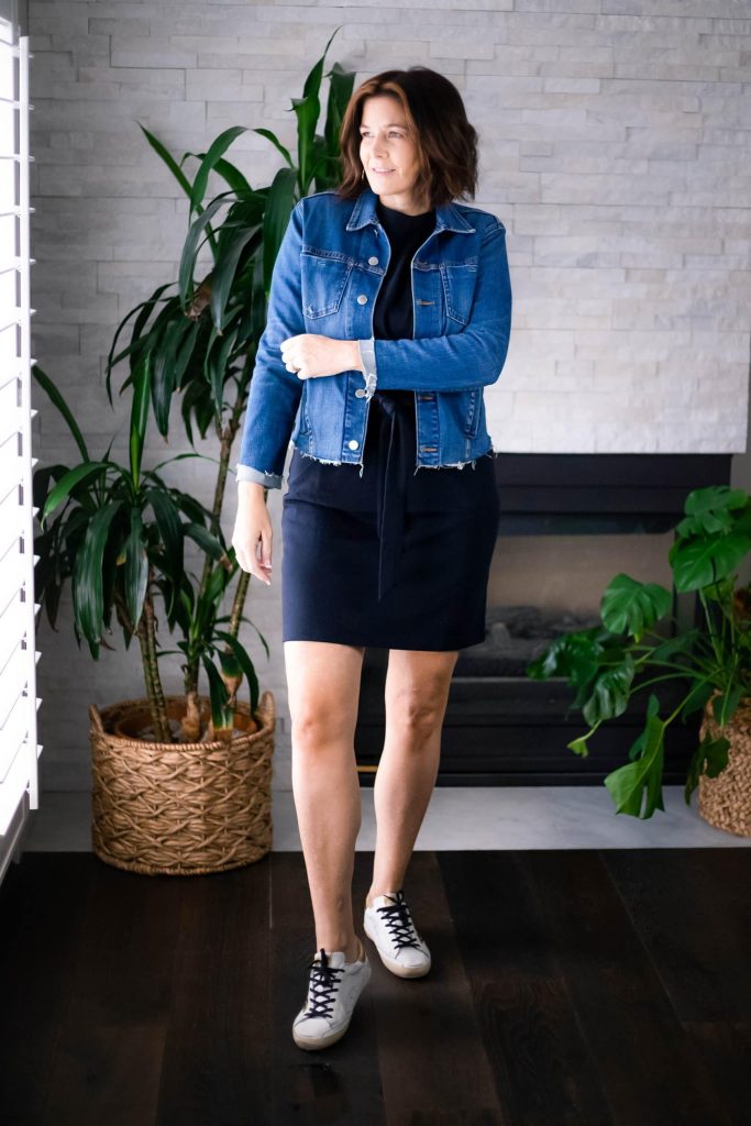 Women wearing Vince Tie Front T shirt Dress, L'agence denim jacket with GGDB sneakers