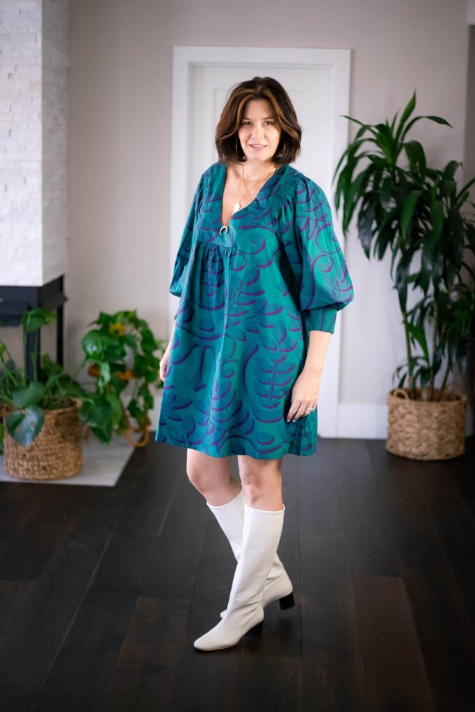 Women wearing smock dress and boots