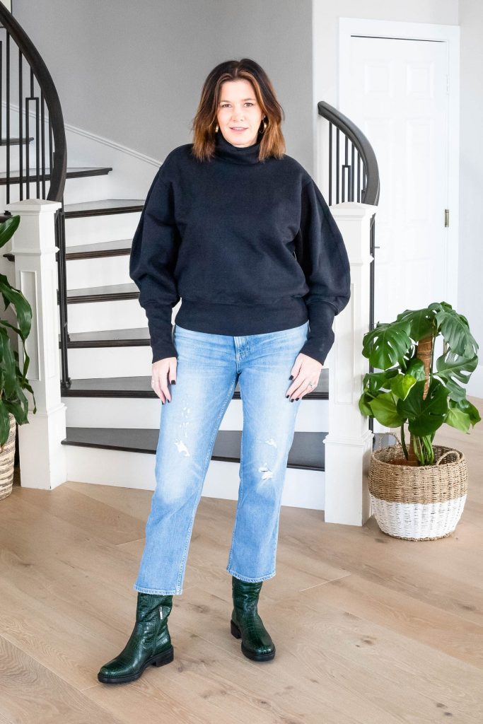 Over 50 women wearing AGOLDE sweatshirt, jeans and lug sole boots