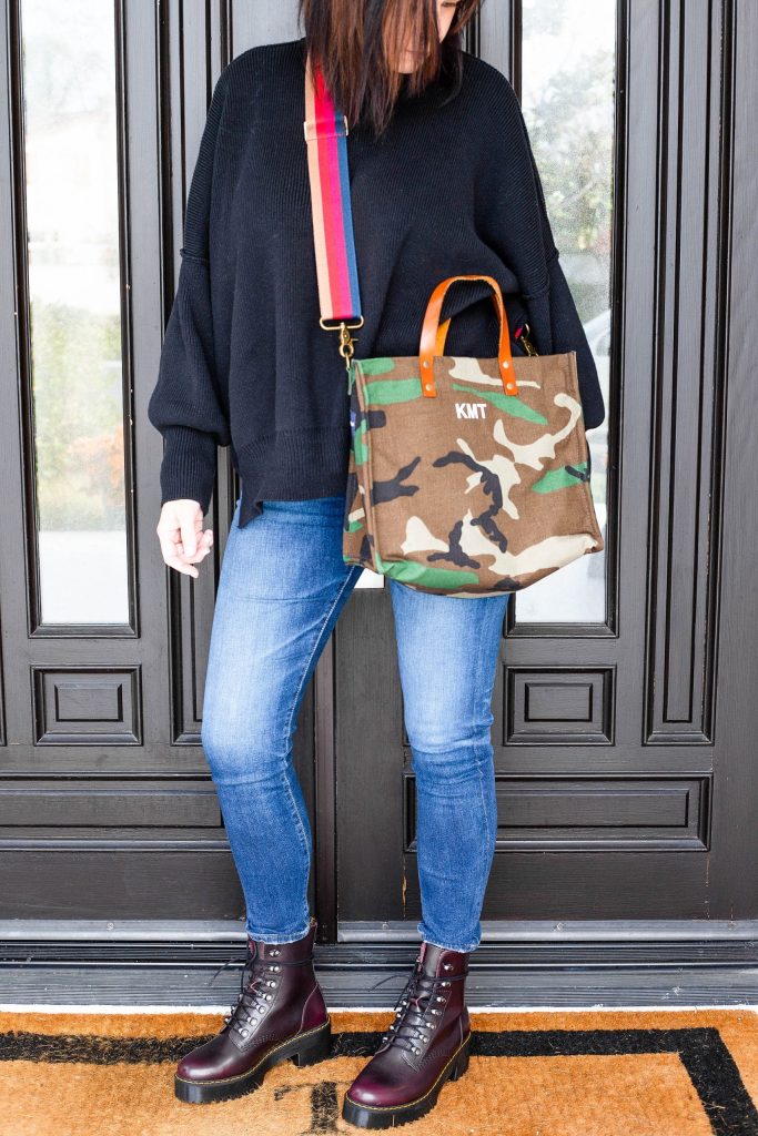 Midlife women wearing Dr. Marten's Leona boot, Free People sweater, and jeans 